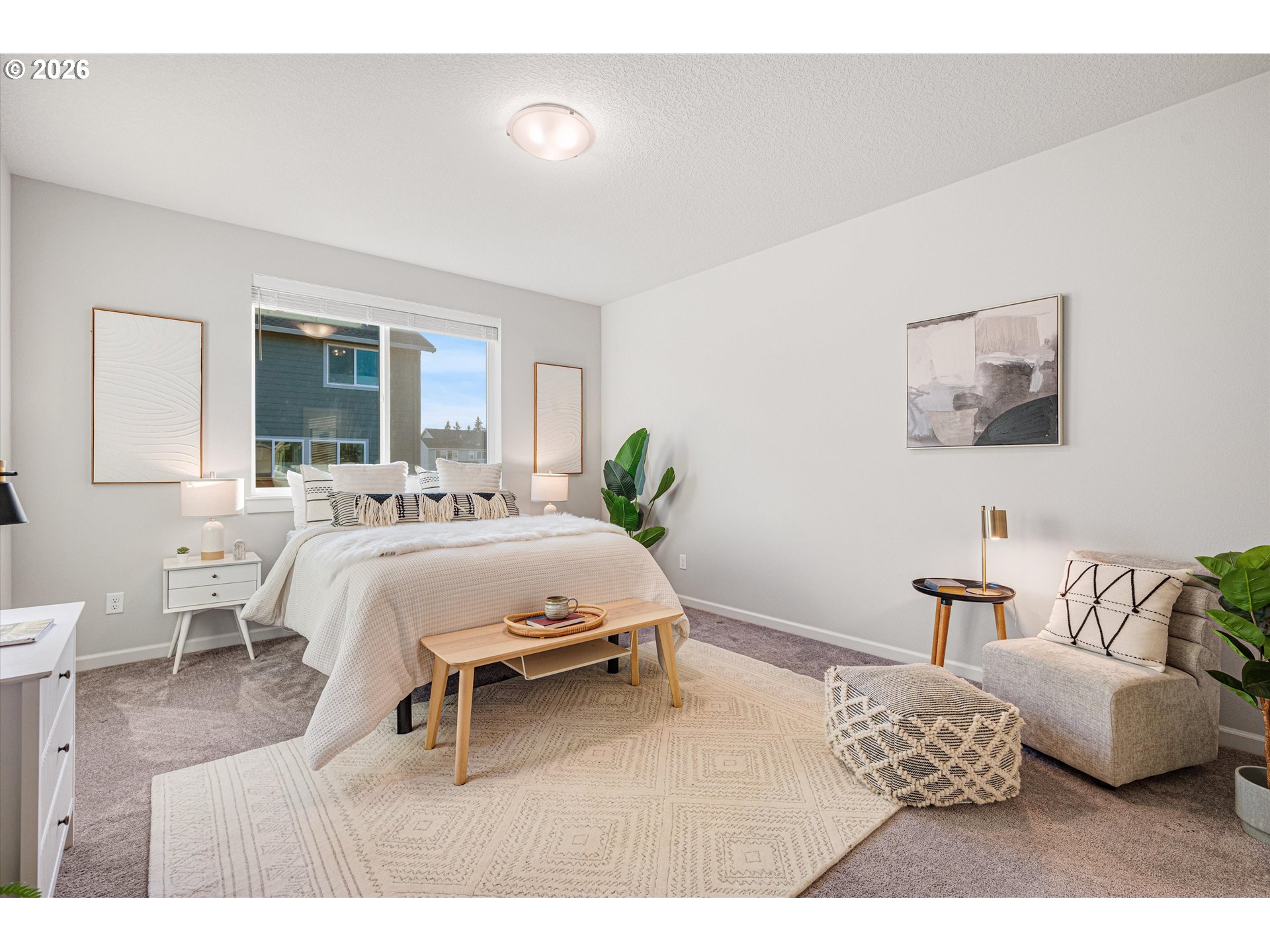 2637 South 6th Way Ridgefield, WA 98642 - Photo 19 of 41 a bedroom with a bed and wooden floor