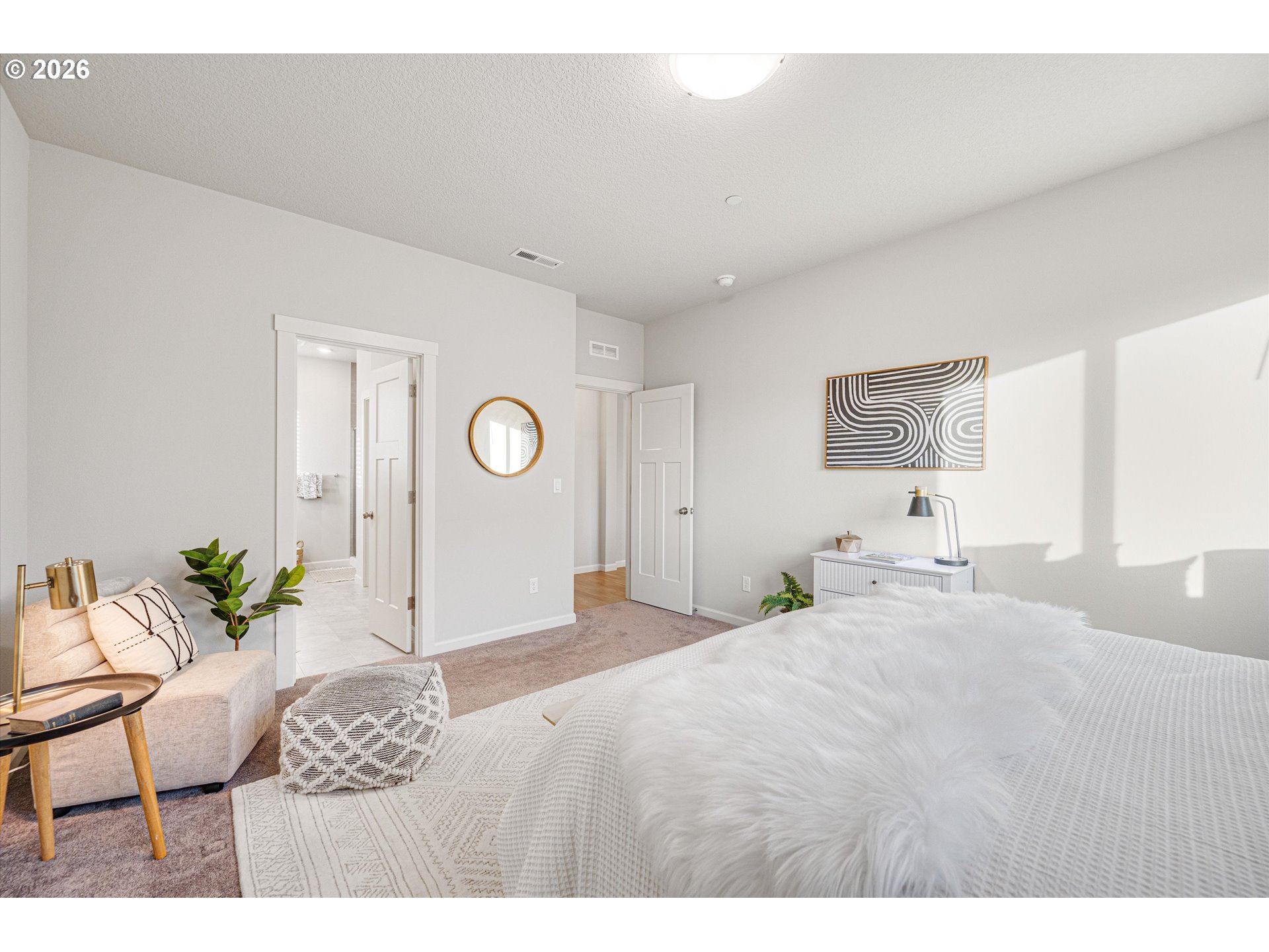 2637 South 6th Way Ridgefield, WA 98642 - Photo 20 of 41 a bedroom with a bed and a table