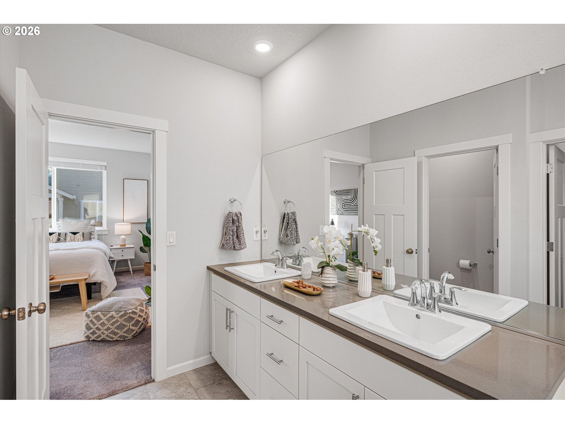 2637 South 6th Way Ridgefield, WA 98642 - Photo 23 of 41 a bathroom with a sink a mirror and a vanity
