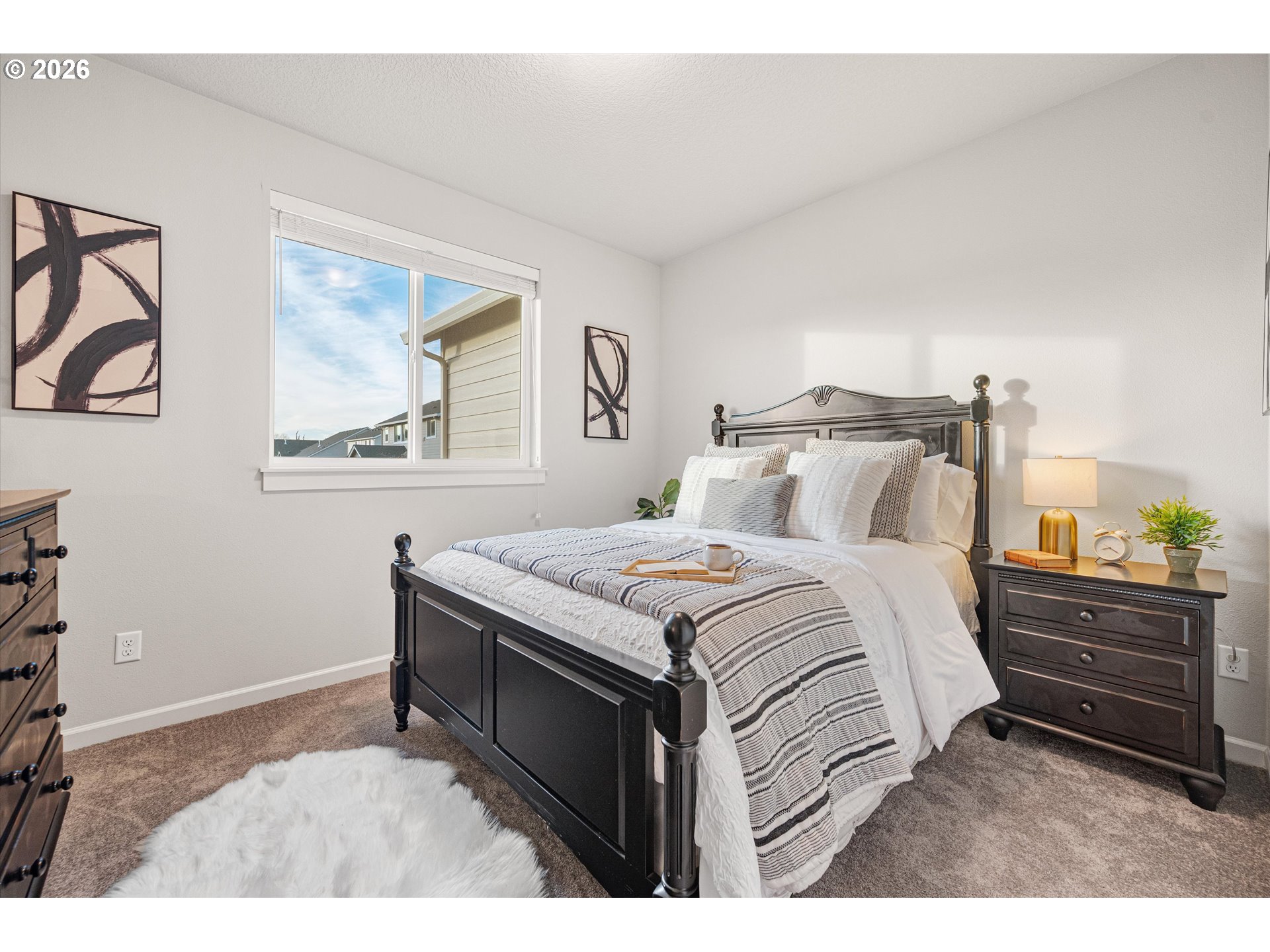 2637 South 6th Way Ridgefield, WA 98642 - Photo 26 of 41 a bedroom with a bed and a dresser