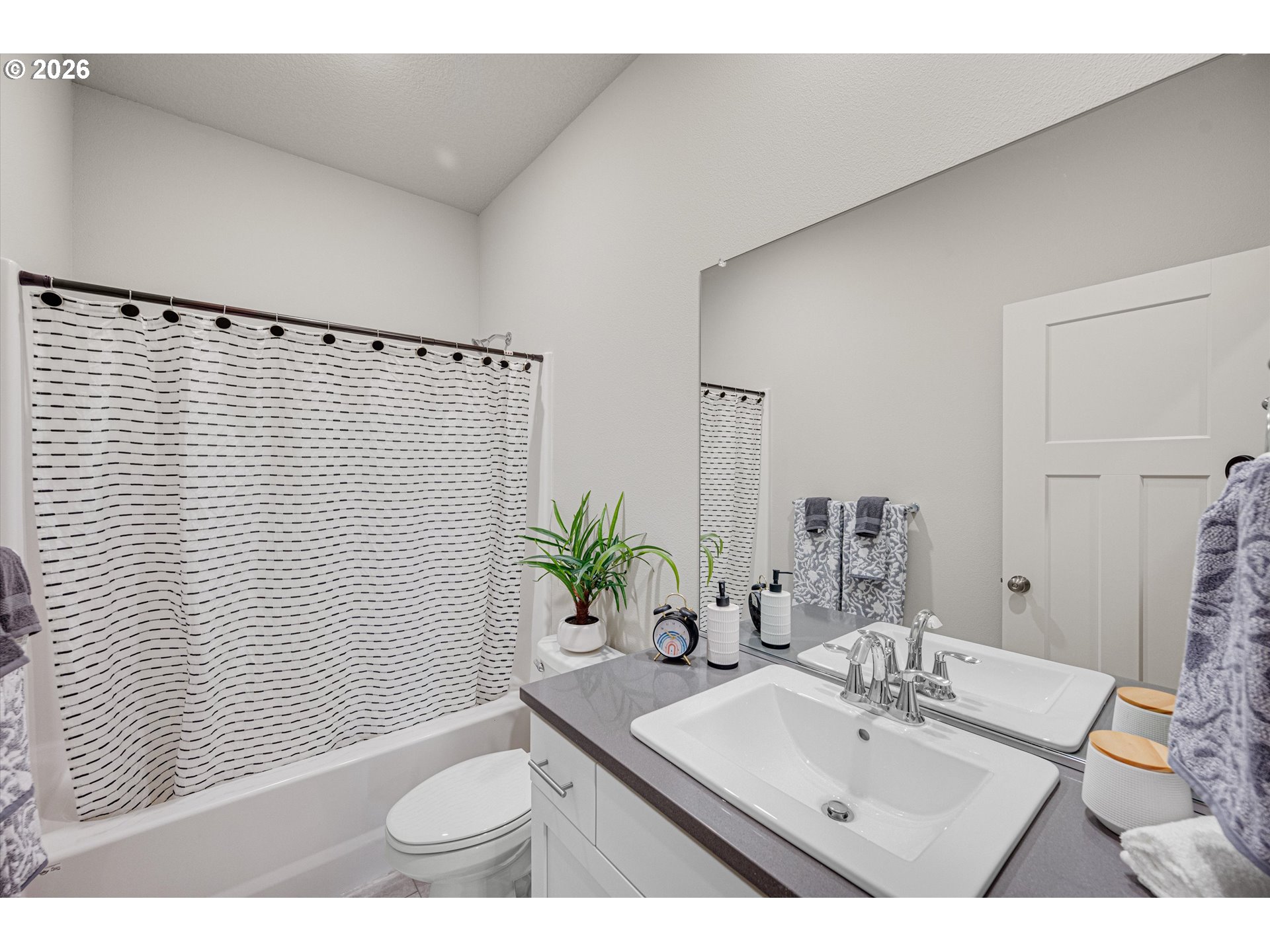2637 South 6th Way Ridgefield, WA 98642 - Photo 27 of 41 a bathroom with a sink and a mirror