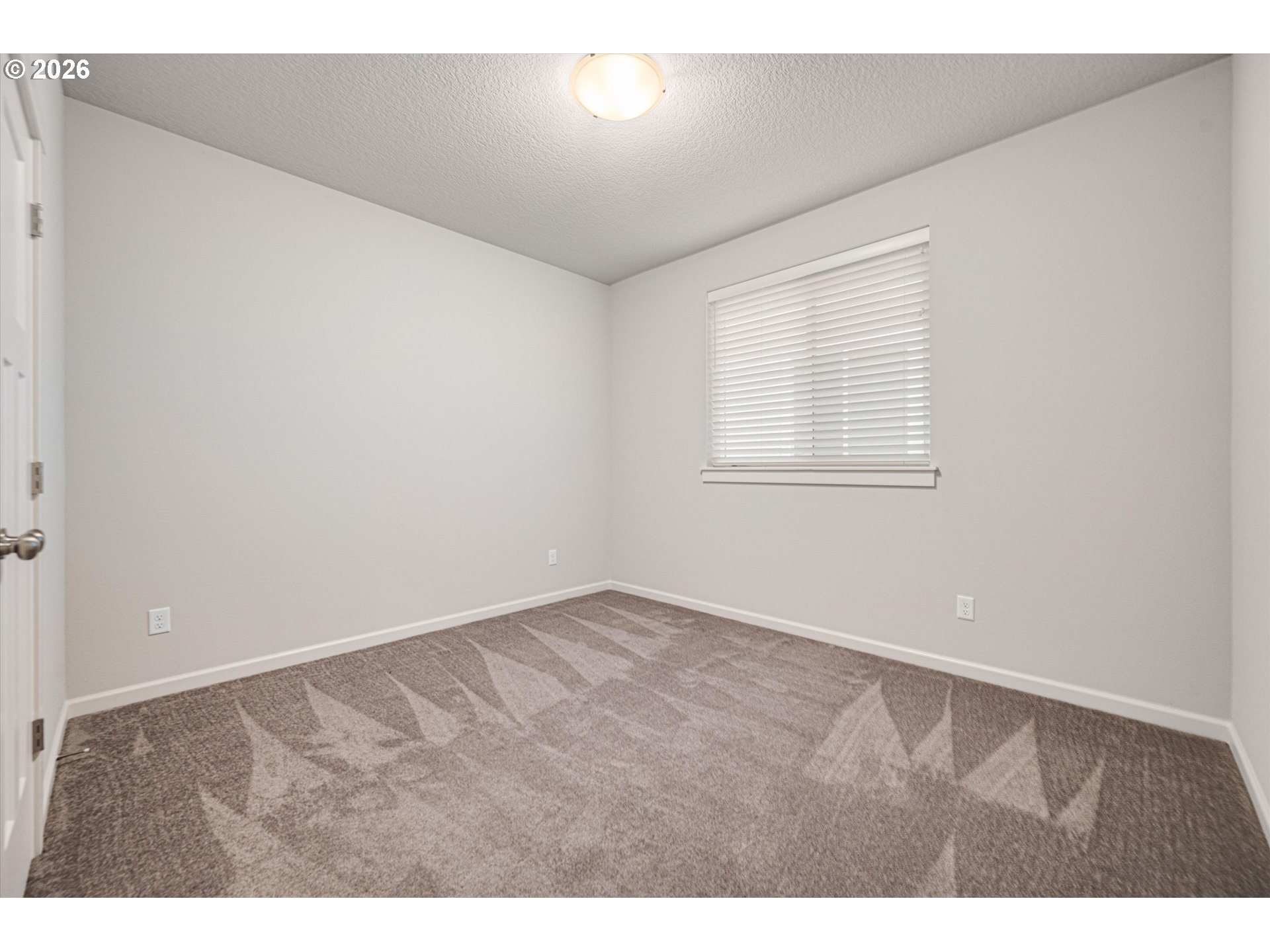 2637 South 6th Way Ridgefield, WA 98642 - Photo 28 of 41 an empty room with windows