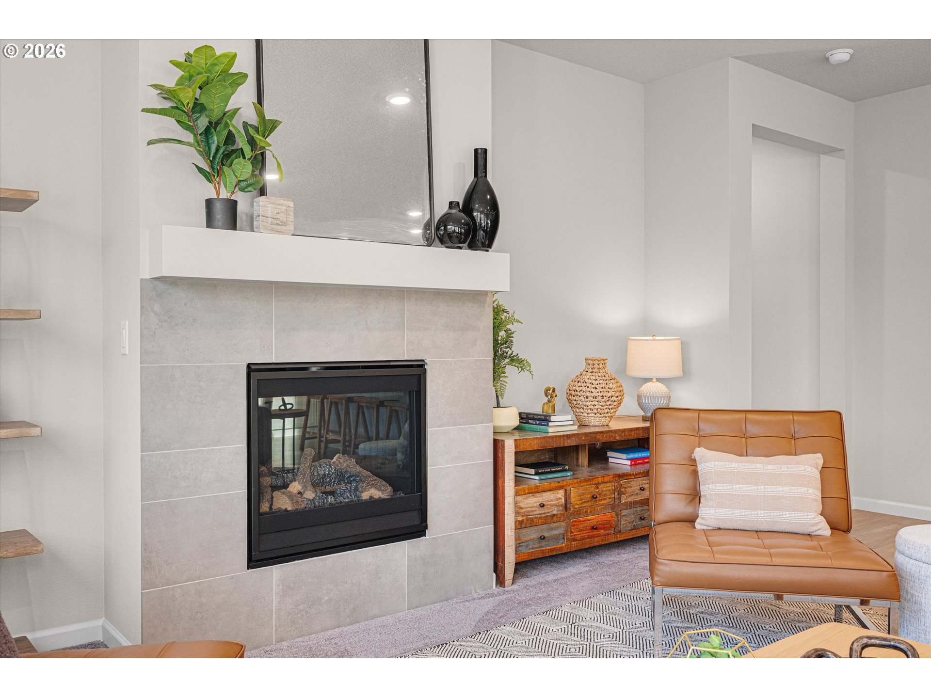 2637 South 6th Way Ridgefield, WA 98642 - Photo 8 of 41 a living room with furniture and a fireplace