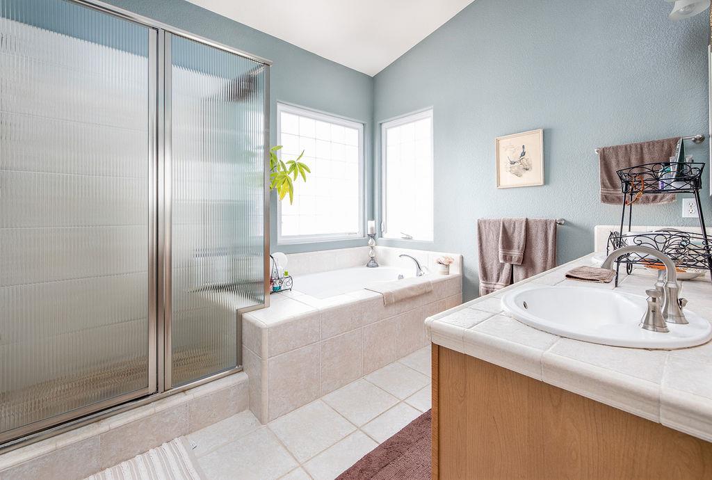 265 Blueridge Street Soledad, CA 93960 - Photo 20 of 33 a bathroom with a sink and a mirror