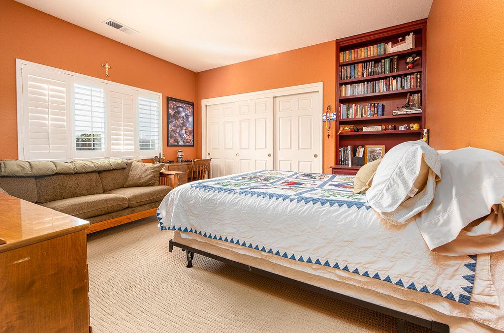 265 Blueridge Street Soledad, CA 93960 - Photo 22 of 33 a bedroom with a bed and a couch