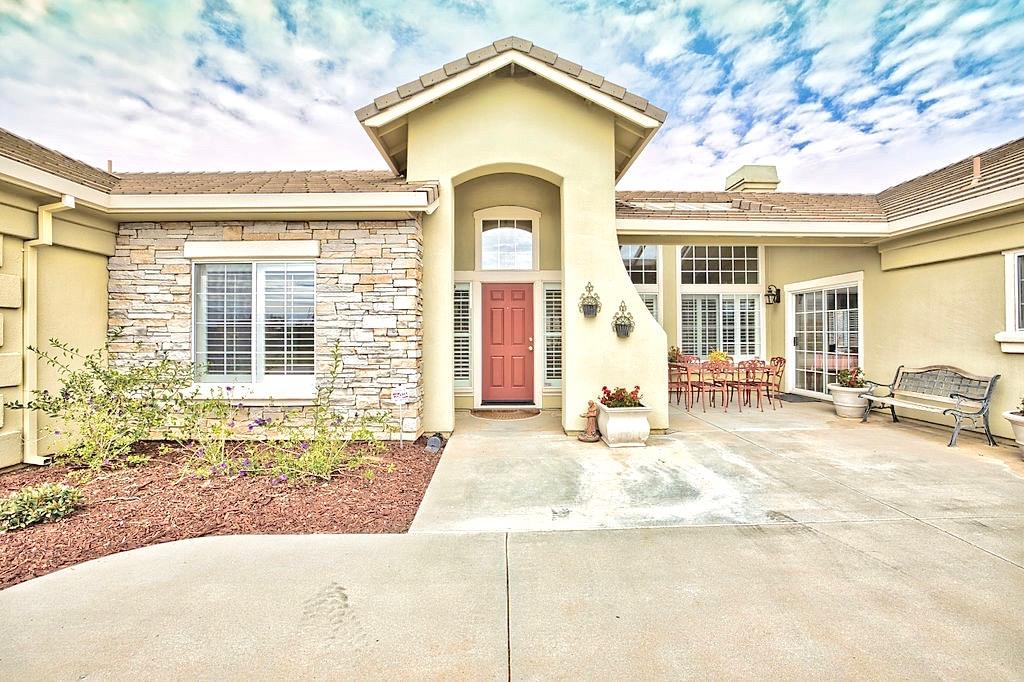 265 Blueridge Street Soledad, CA 93960 - Photo 3 of 33 a view of a house with wooden fence