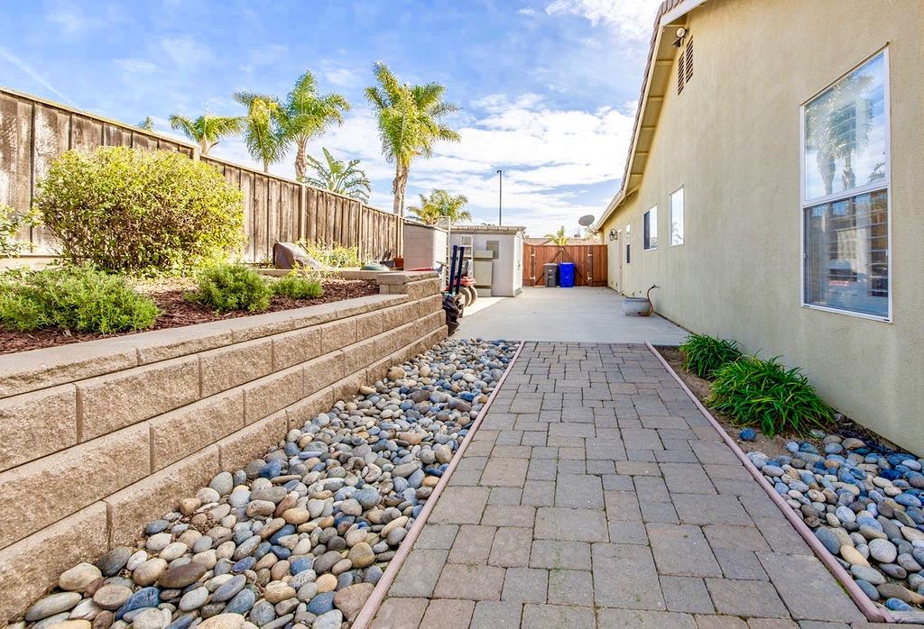 265 Blueridge Street Soledad, CA 93960 - Photo 32 of 33 a view of a pathway with a flower garden