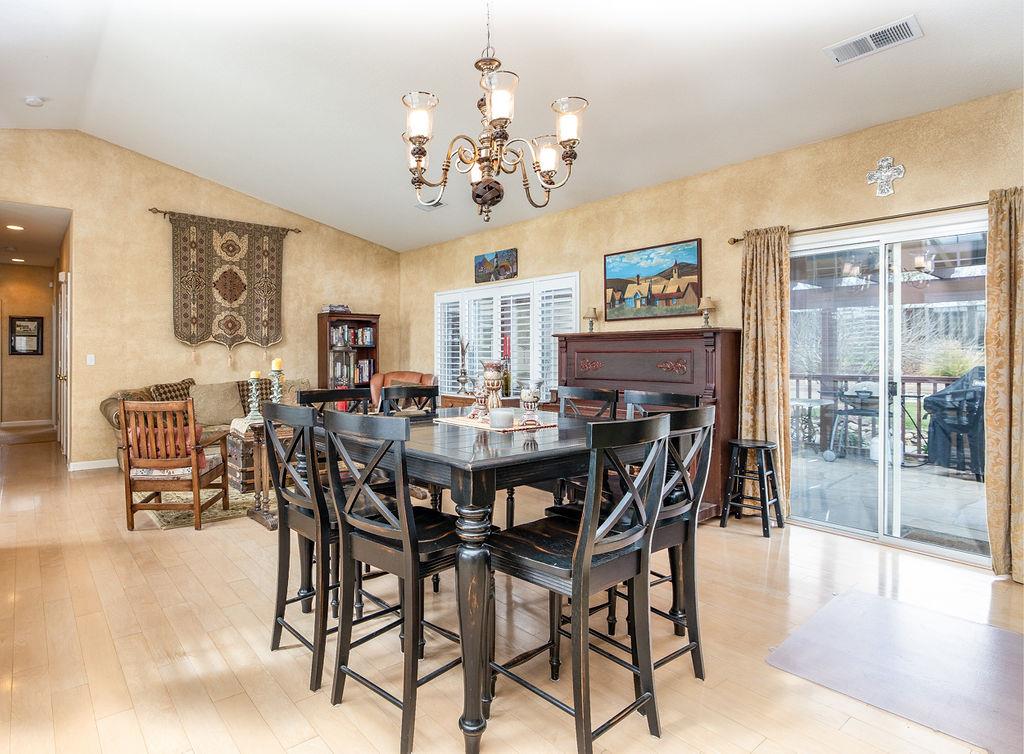265 Blueridge Street Soledad, CA 93960 - Photo 7 of 33 a view of a dining room with furniture wooden floor and chandelier