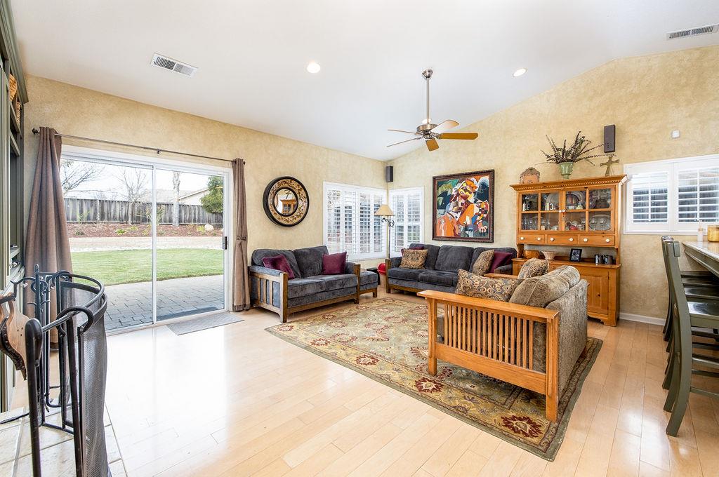 265 Blueridge Street Soledad, CA 93960 - Photo 8 of 33 a living room with furniture a fireplace and a flat screen tv