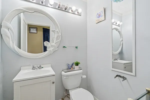 a utility room with dryer and sink