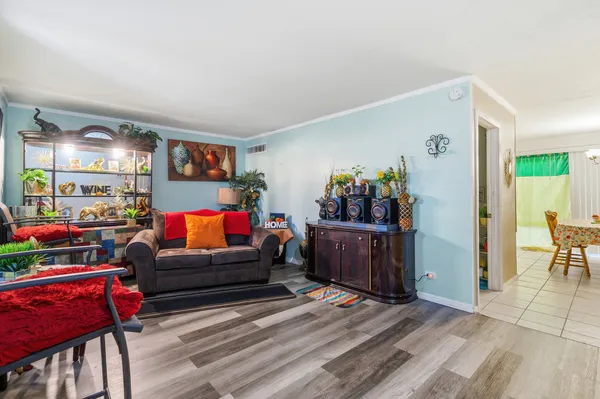 a living room with furniture and a window