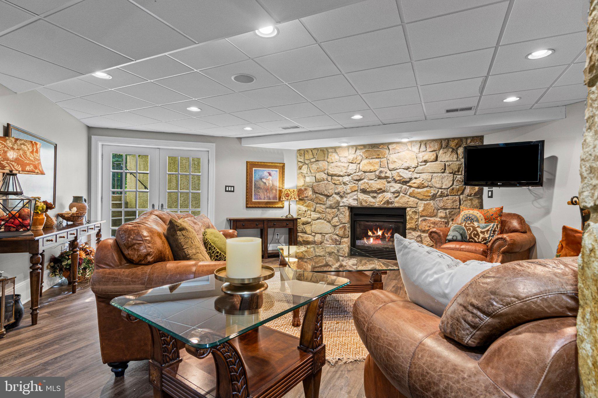825 Oak Tree Road Kennett Square, PA 19348 - Photo 67 of 125 Lower Level Family Room w Gas FP