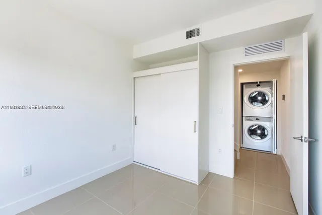 a view of a storage & utility room with a washer and dryer