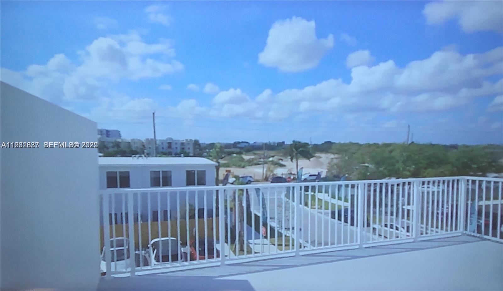 25810 Southwest 144th Avenue Homestead, FL 33032 - Photo 6 of 9 a view of a city from a balcony
