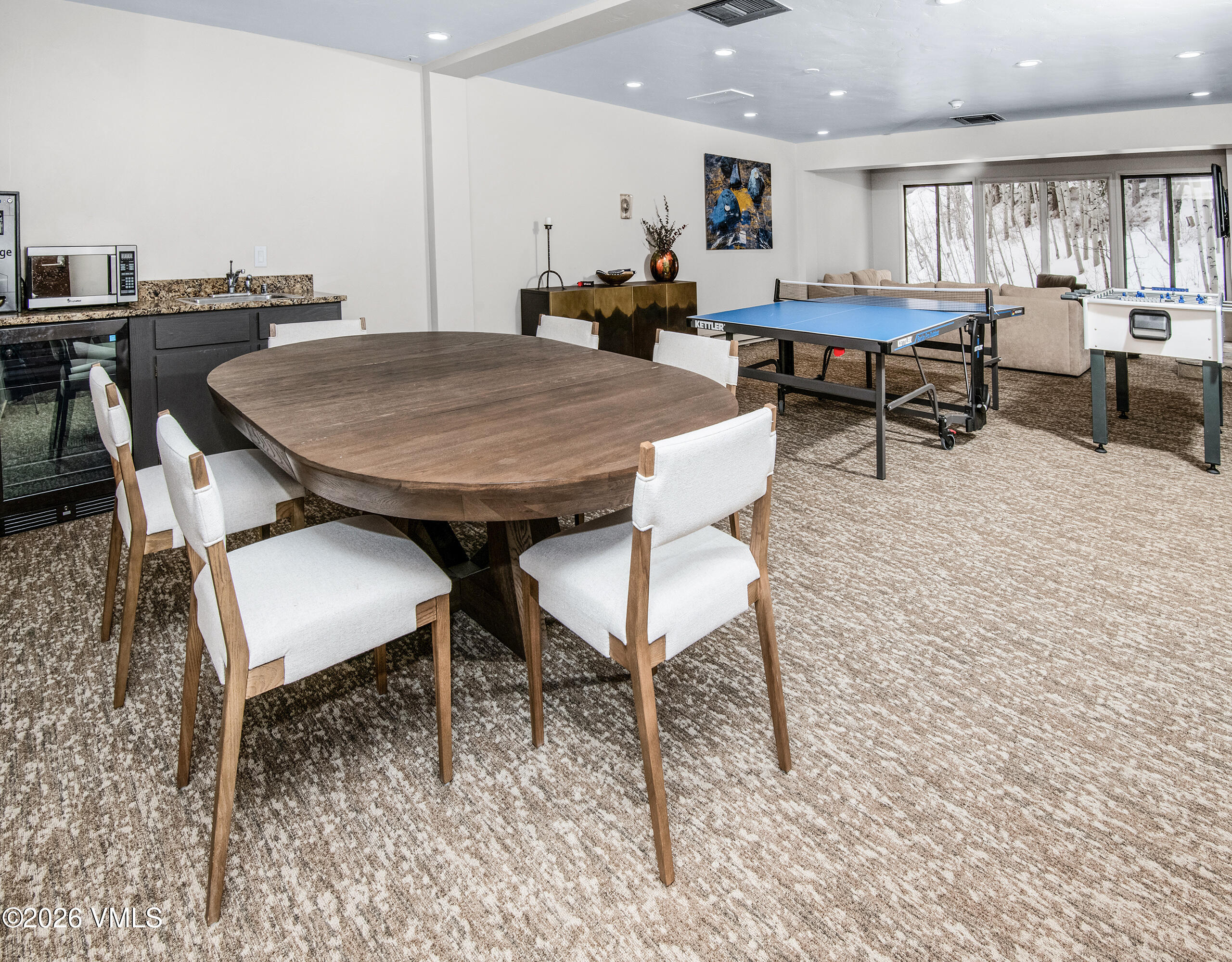 1650 Fall Ridge Road, Unit 202 Vail, CO 81657 - Photo 21 of 32 a view of a dining room with furniture