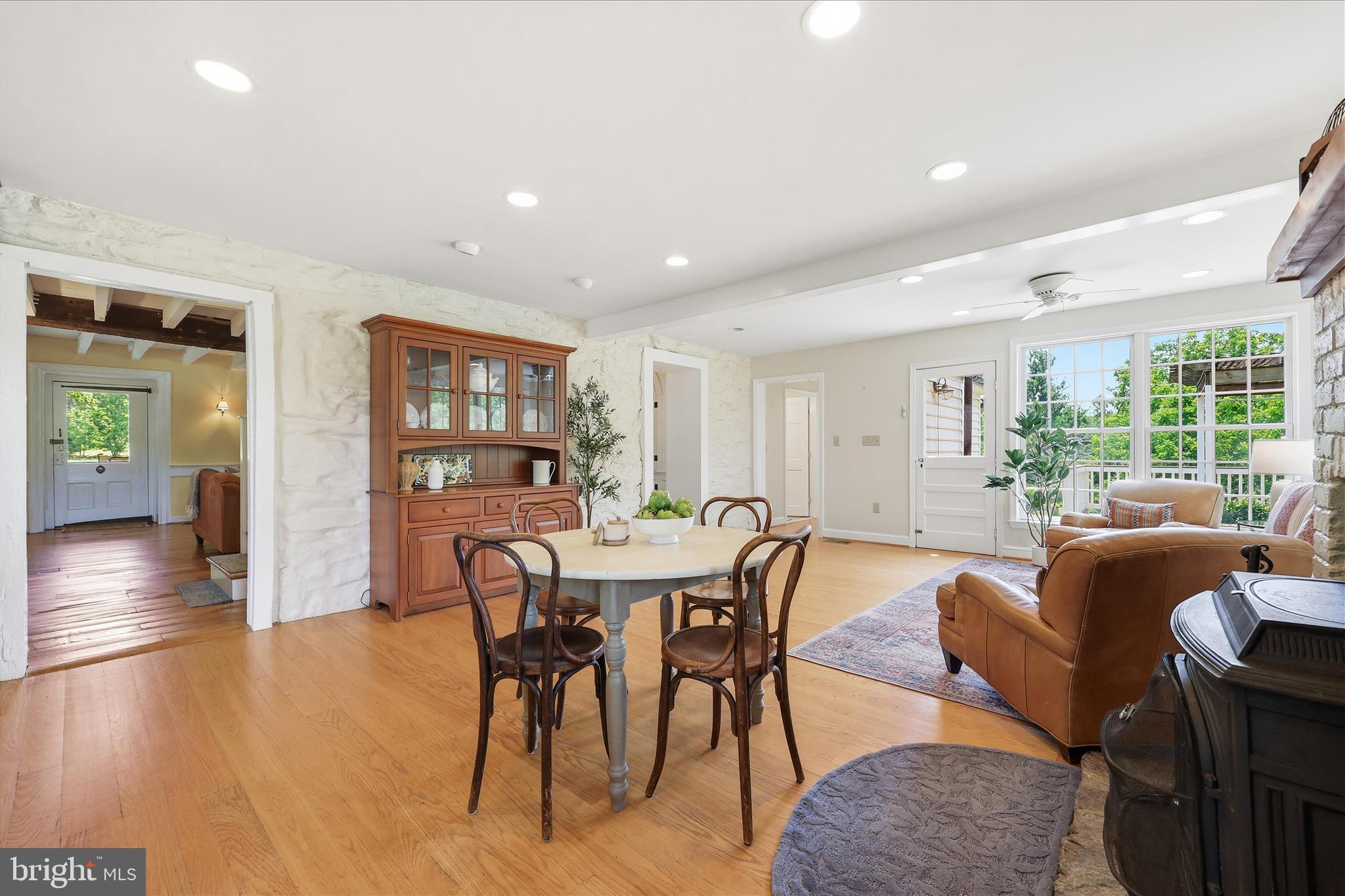 10919 Etzler Mill Road Woodsboro, MD 21798 - Photo 11 of 54 a view of a dining room with furniture window and wooden floor