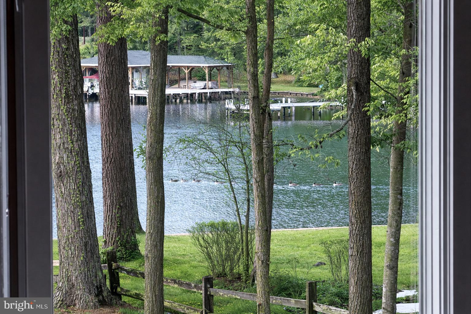 3300 Viola Way Bumpass, VA 23024 - Photo 11 of 36 a backyard of a house with lots of green space