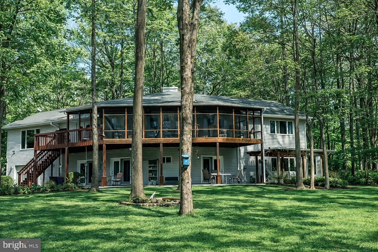 3300 Viola Way Bumpass, VA 23024 - Photo 2 of 36 a view of an house with backyard space and balcony