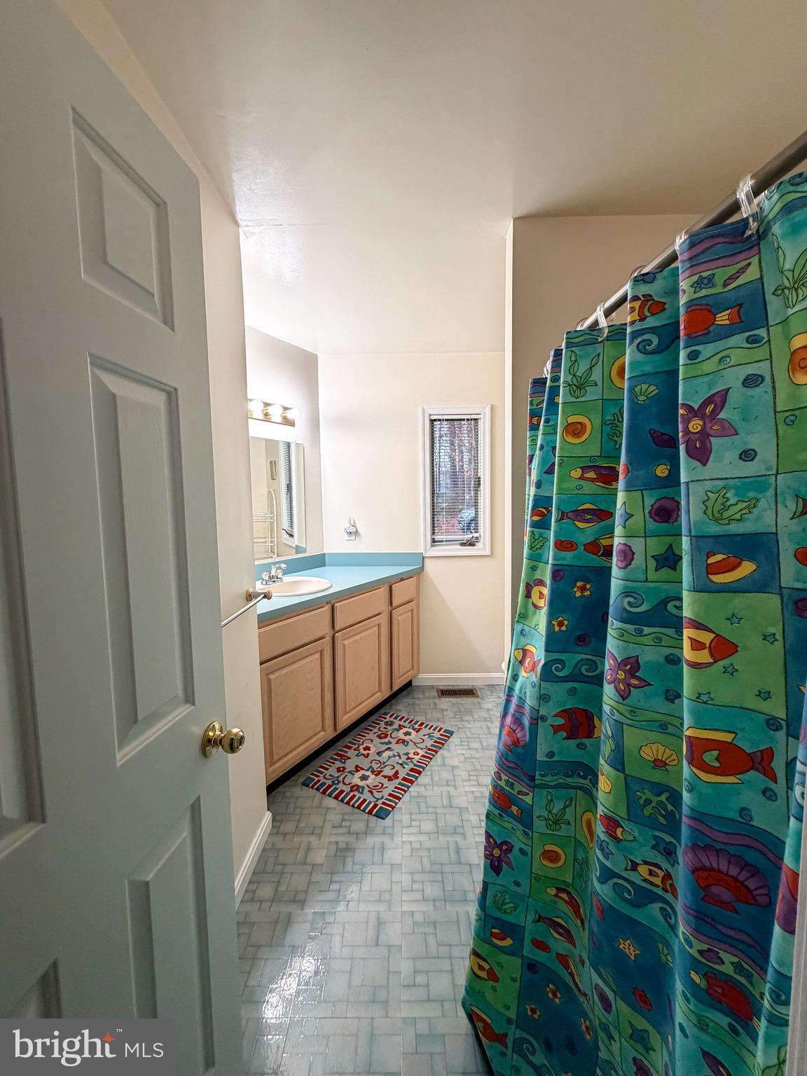 3300 Viola Way Bumpass, VA 23024 - Photo 24 of 36 a kitchen with a sink and cabinets