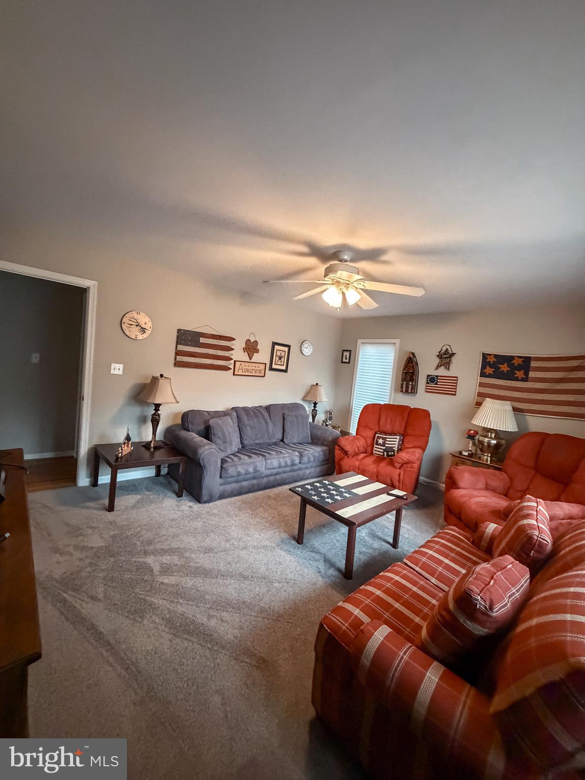 3300 Viola Way Bumpass, VA 23024 - Photo 31 of 36 a living room with furniture and a flat screen tv