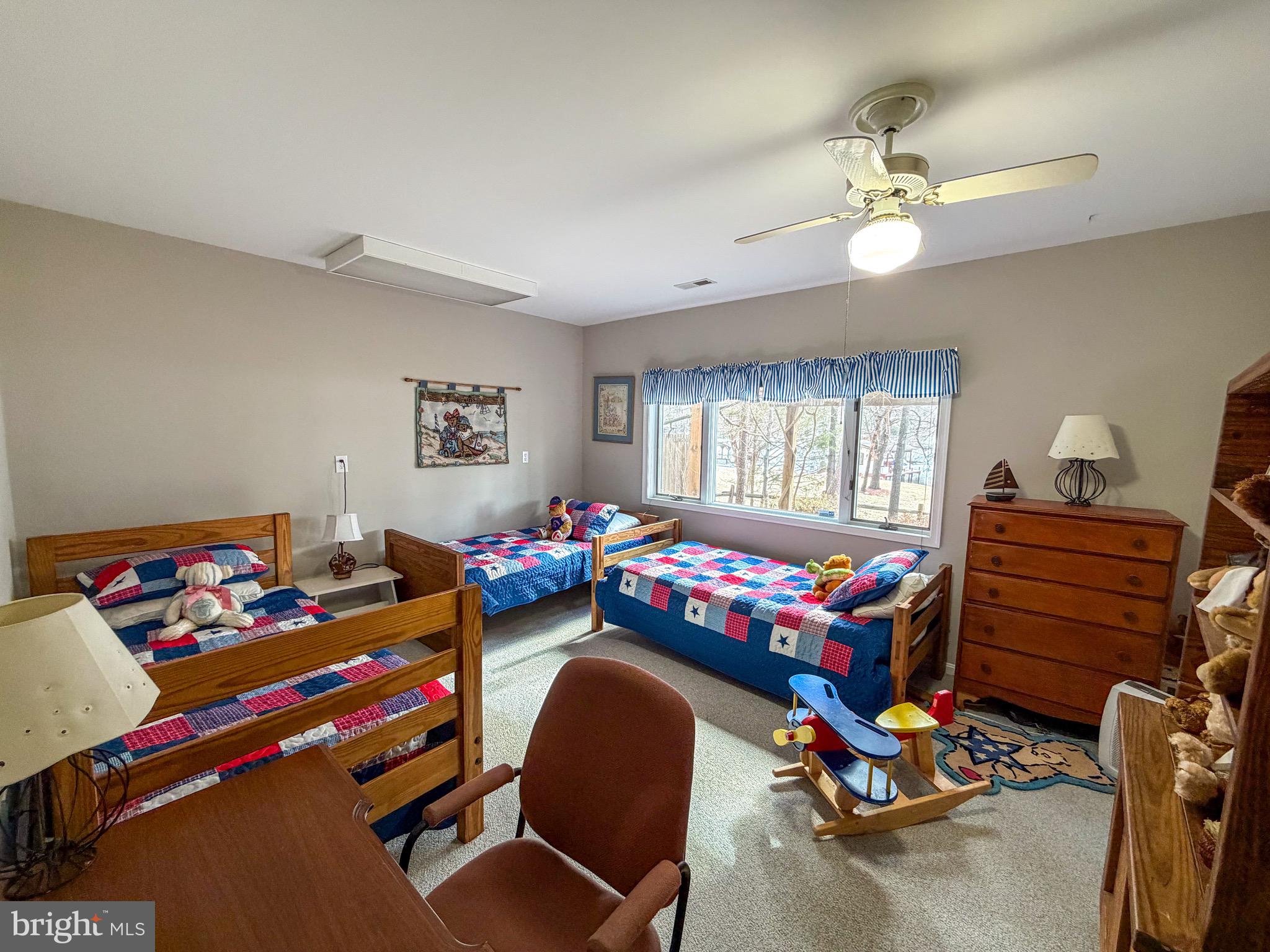 3300 Viola Way Bumpass, VA 23024 - Photo 34 of 36 a bedroom with furniture and windows