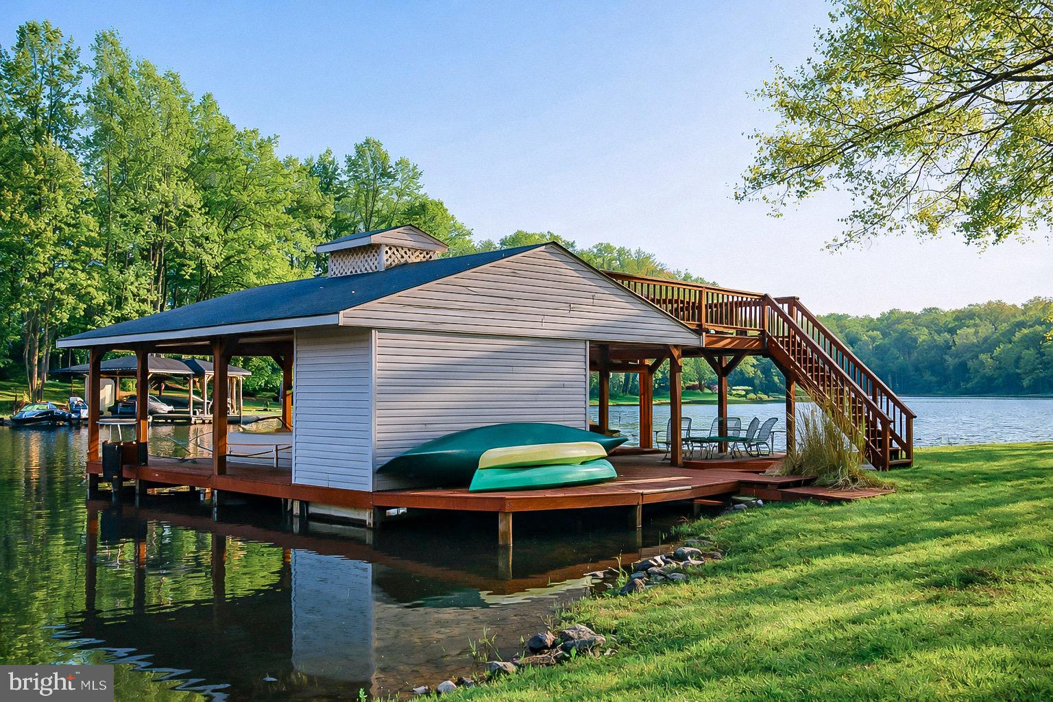 3300 Viola Way Bumpass, VA 23024 - Photo 35 of 36 a backyard of a house with barbeque oven and garden