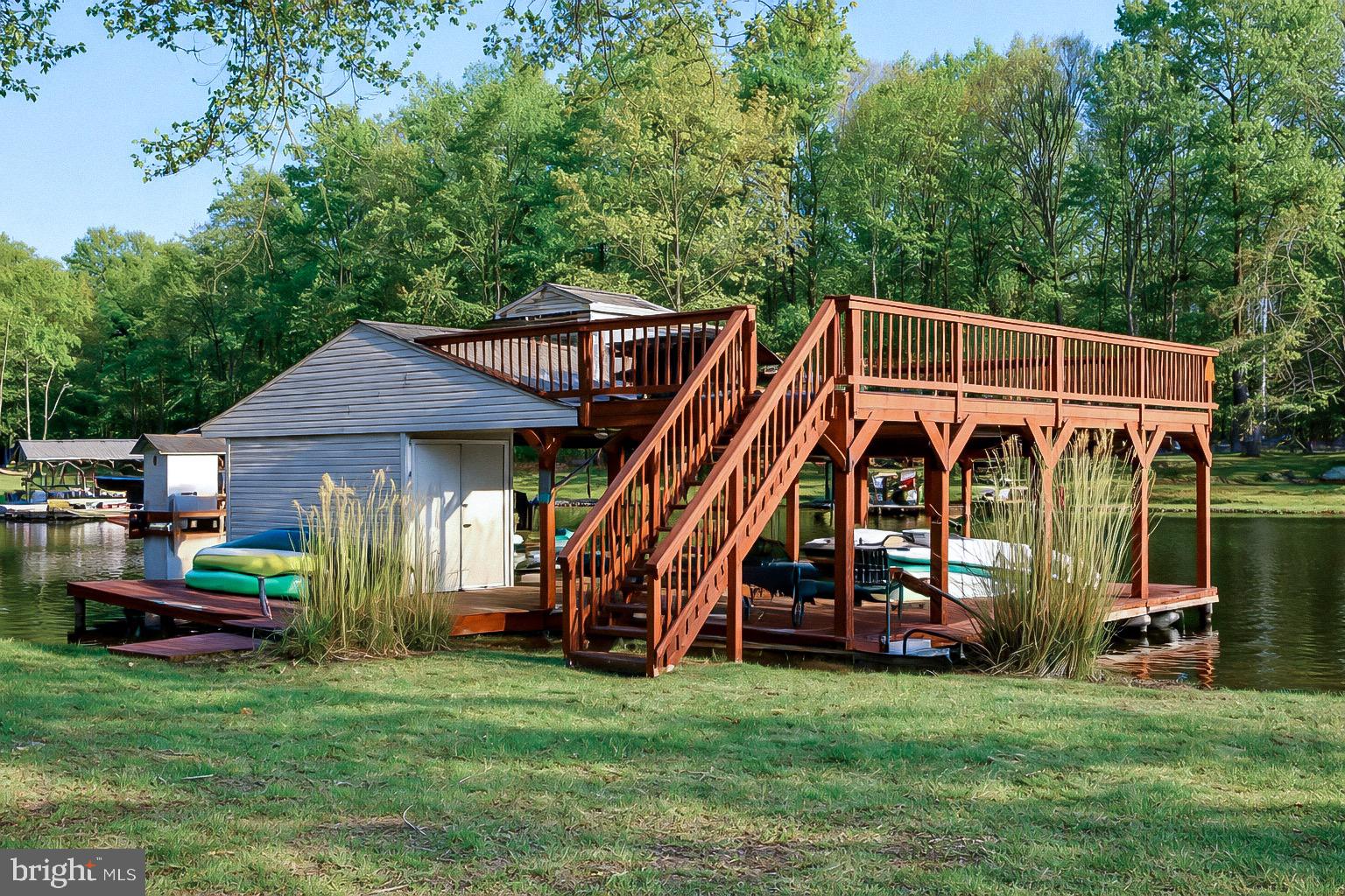 3300 Viola Way Bumpass, VA 23024 - Photo 36 of 36 a view of a house with backyard and deck