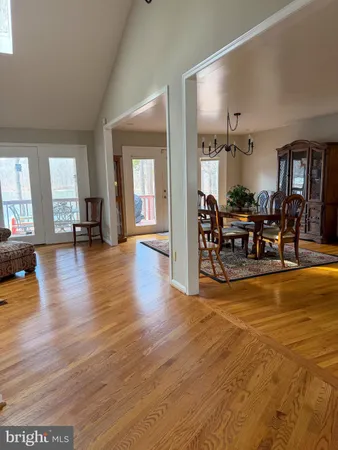 a view of a living room and dining room