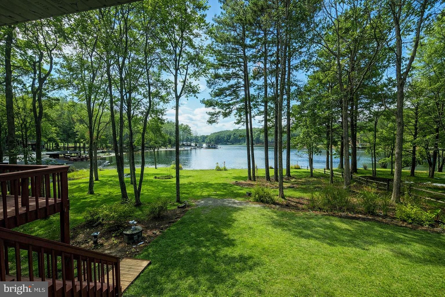 3300 Viola Way Bumpass, VA 23024 - Photo 10 of 36 a view of a park and trees in the background