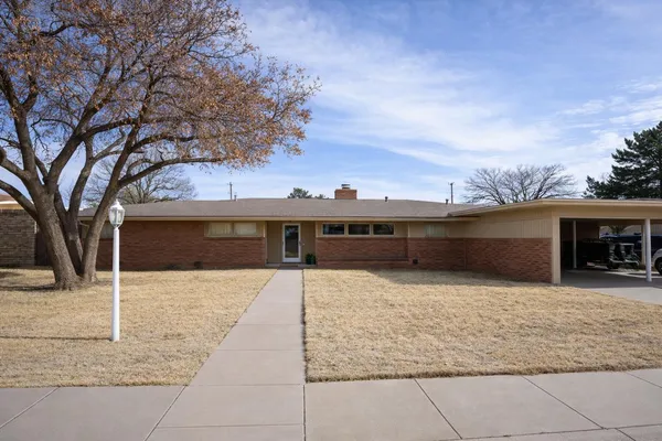 a view of house with outdoor space