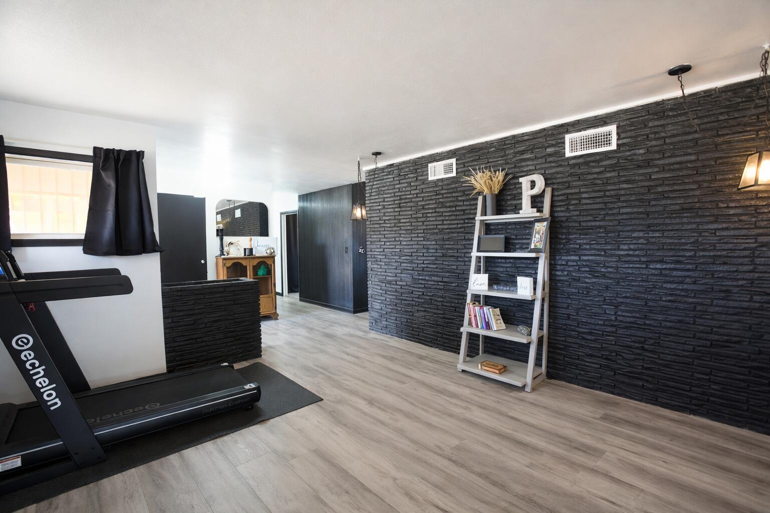 730 South 17th Street Slaton, TX 79364 - Photo 4 of 23 a view of a livingroom with furniture and wooden floor