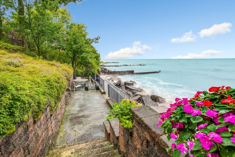 473 Sheridan Road Winnetka, IL 60093 - Photo 28 of 32 a view of a pathway with flower plants