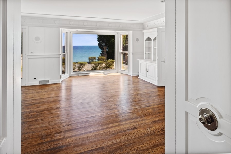 473 Sheridan Road Winnetka, IL 60093 - Photo 3 of 32 a view of a entryway door with wooden floor