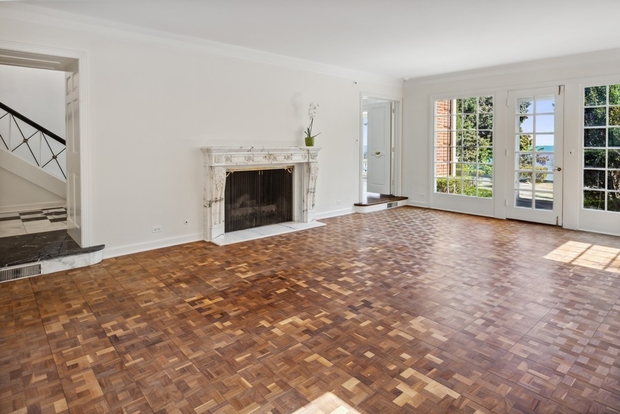 473 Sheridan Road Winnetka, IL 60093 - Photo 8 of 32 a view of empty room with window and fireplace