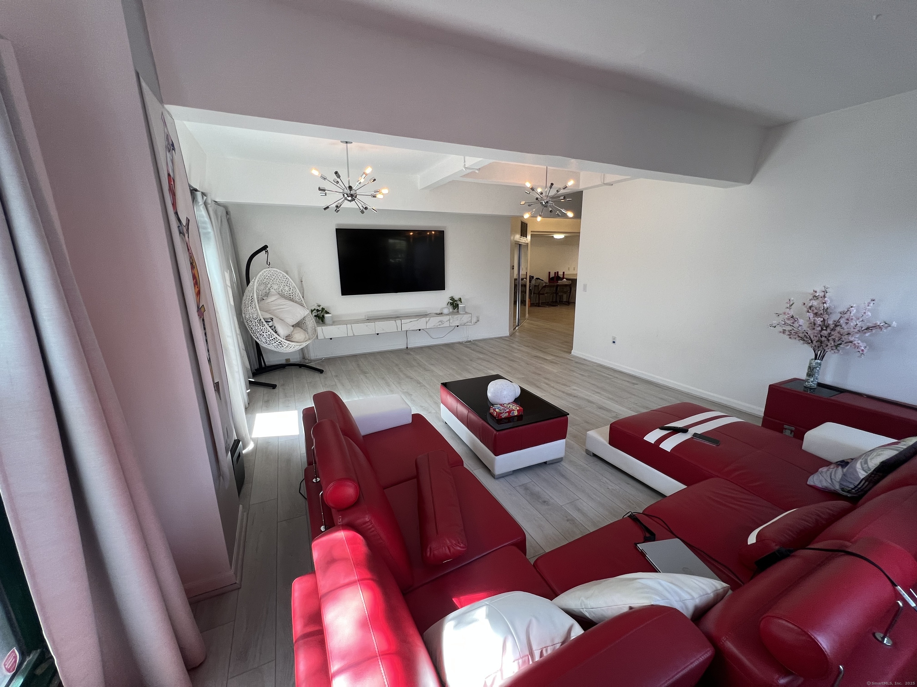 1 Front Street, Unit 1 New Haven, CT 06513 - Photo 19 of 23 a living room with furniture and a flat screen tv