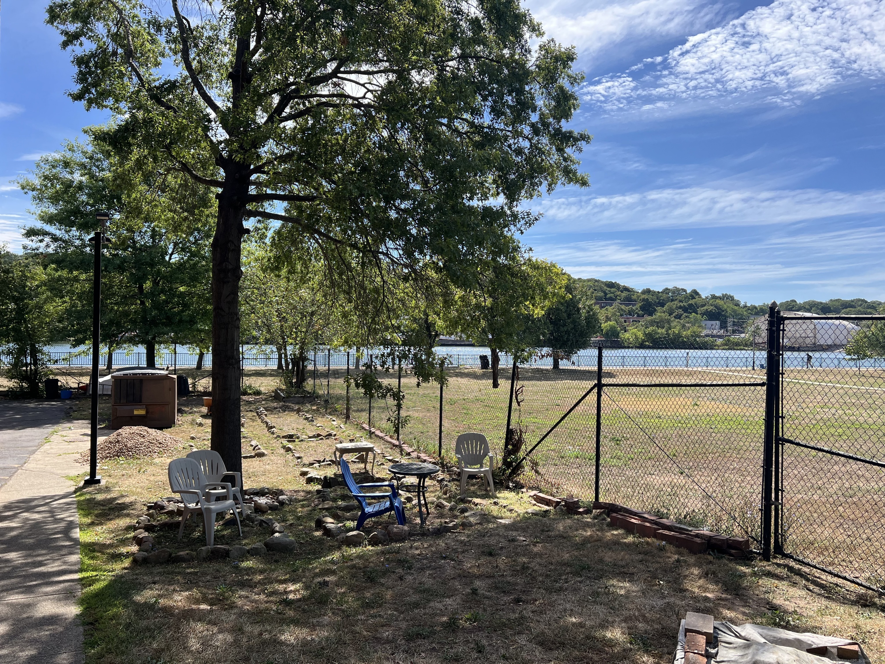 1 Front Street, Unit 1 New Haven, CT 06513 - Photo 20 of 23 a view of a lake with a yard