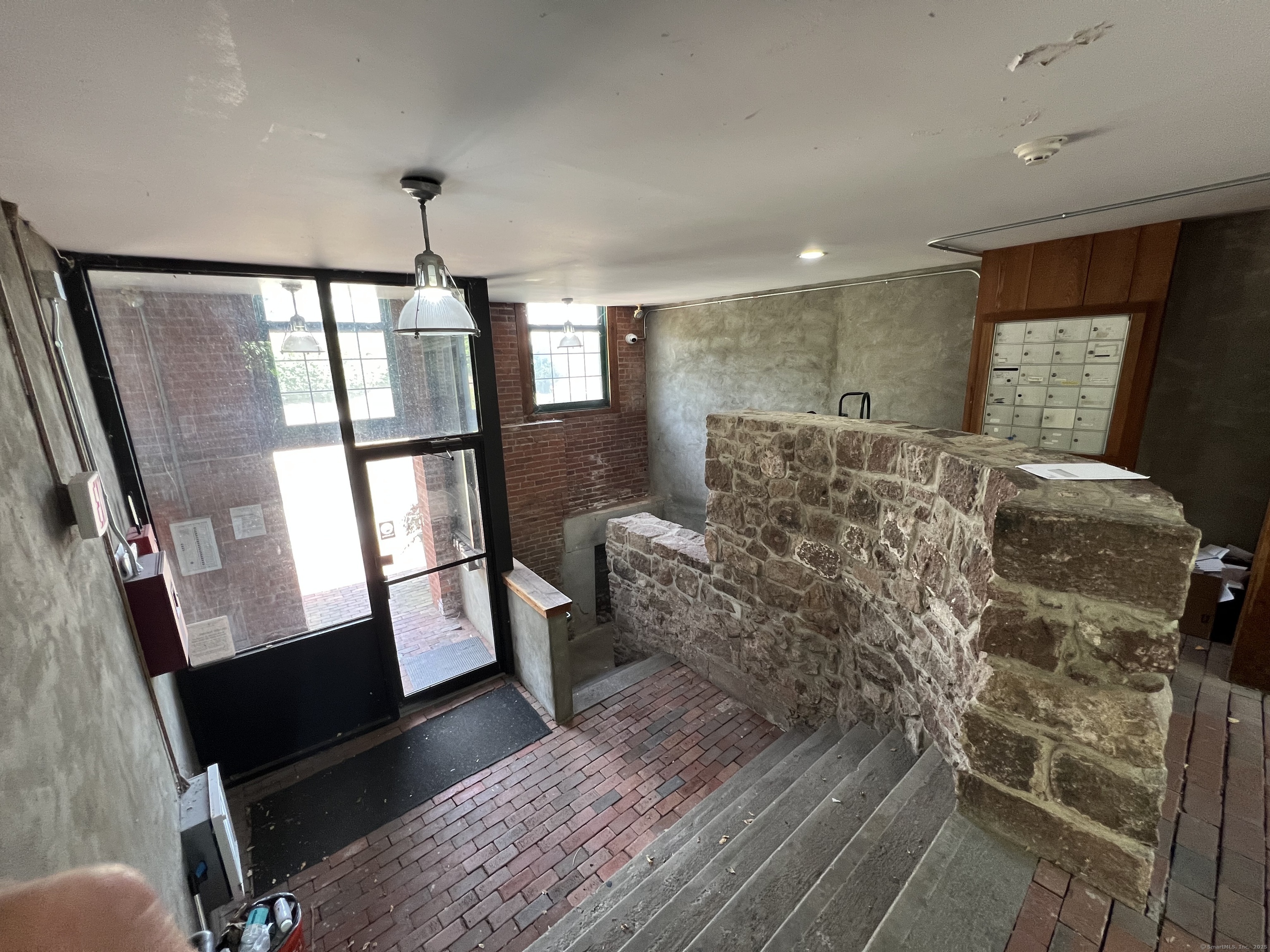 1 Front Street, Unit 1 New Haven, CT 06513 - Photo 21 of 23 a living room with furniture and a window