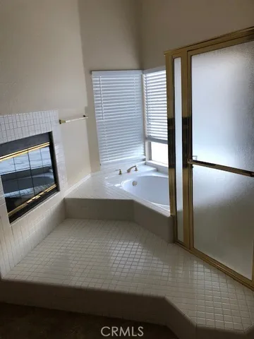 a view of a hallway view with staircase