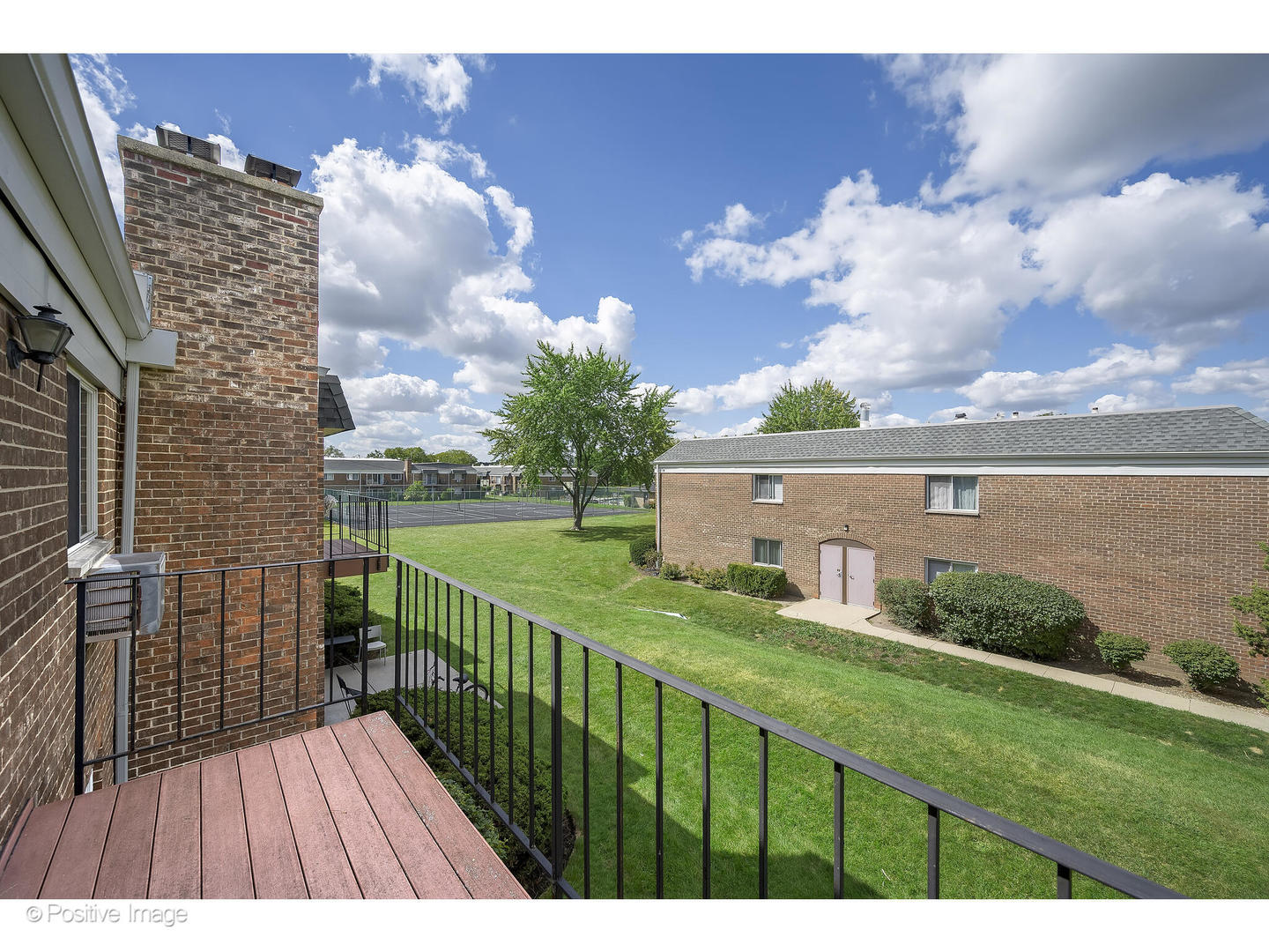 10377 Dearlove Road, Unit 5205 Glenview, IL 60025 - Photo 16 of 23 a view of a house with a yard