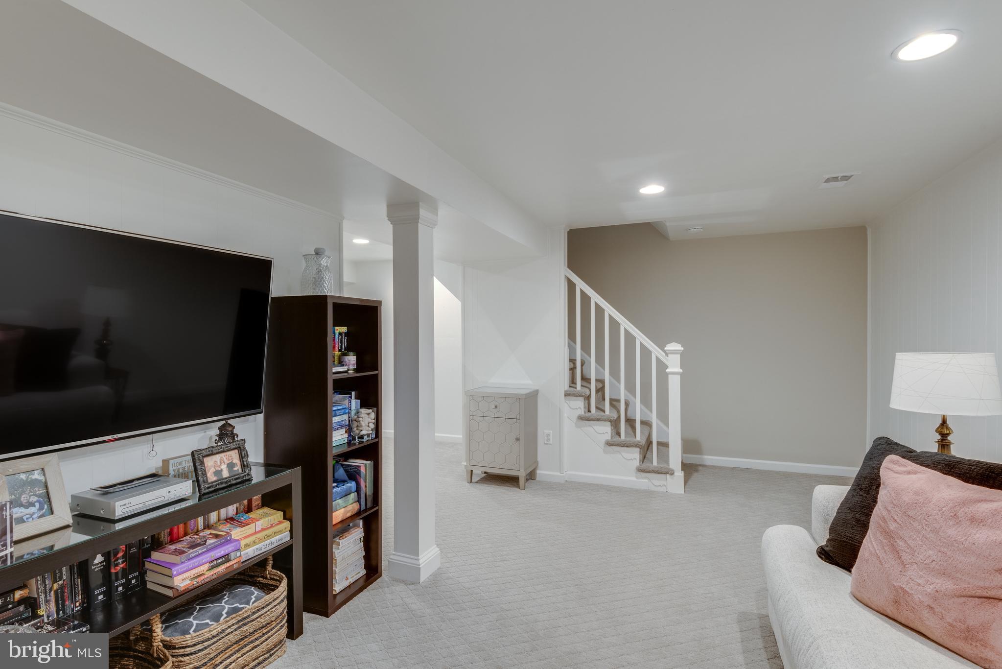 2406 Albot Road Reston, VA 20191 - Photo 21 of 29 Lower level great for kids play and TV area