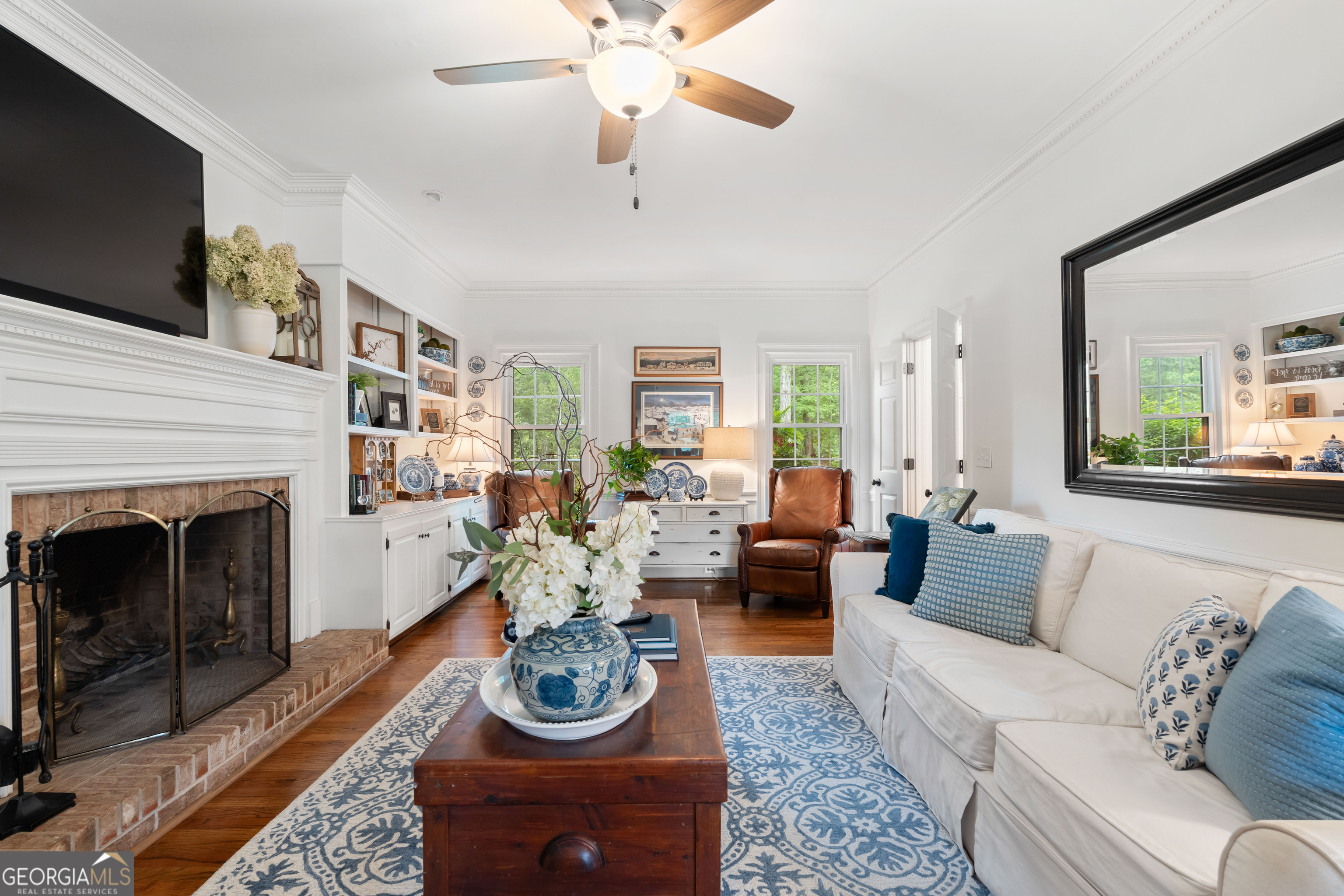 836 Oak Grove Road Carrollton, GA 30117 - Photo 13 of 50 a living room with furniture and a fireplace