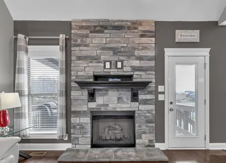 a view of fireplace and window