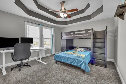 a view of a livingroom with furniture and wooden floor