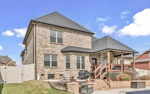 a view of a room with a wooden wall