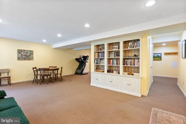 wooden floor with furniture and window in living room