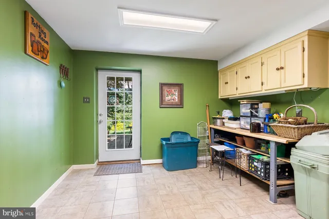 a view of a house with a yard and garage