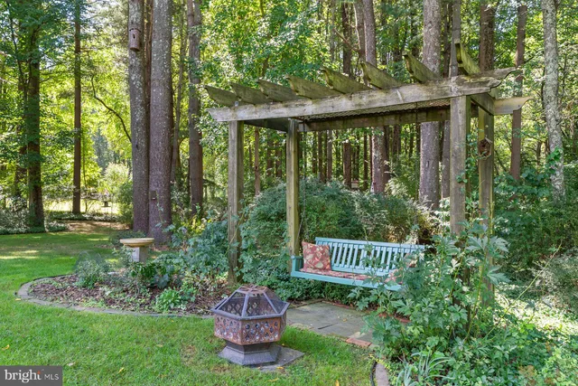 a garden view with a seating space