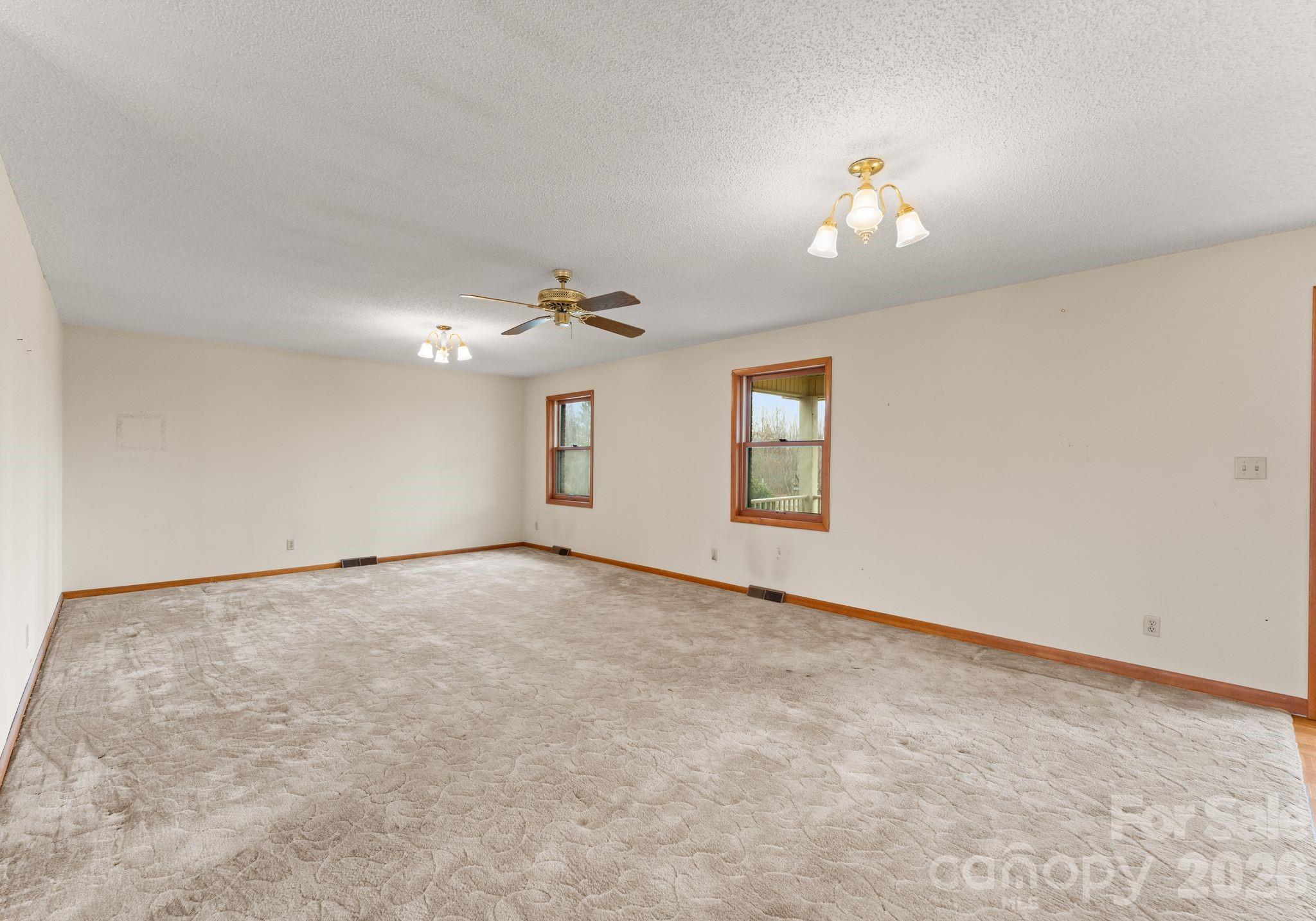 150 Barber Lyerly Road Salisbury, NC 28147 - Photo 11 of 43 a view of an empty room with a window