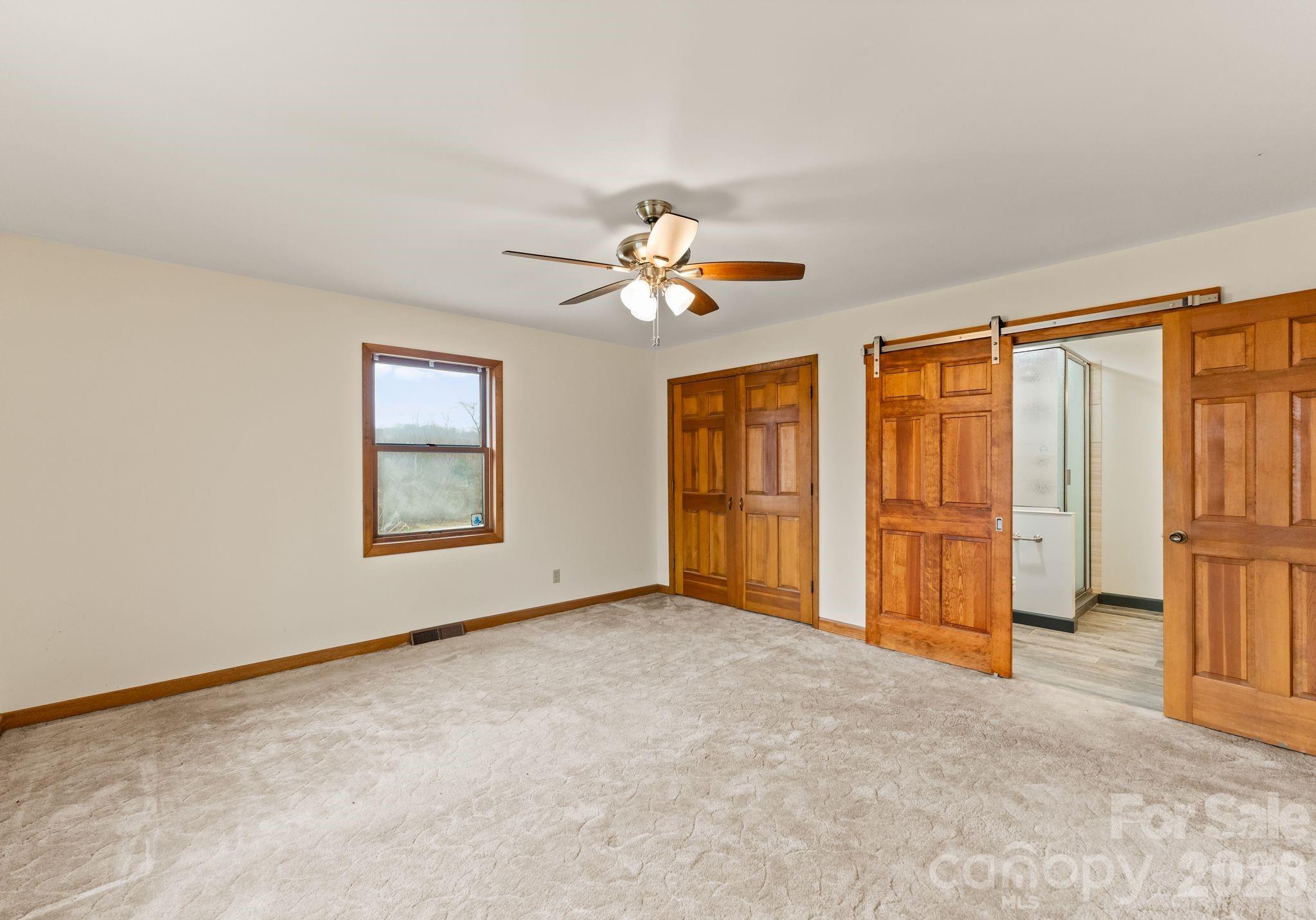 150 Barber Lyerly Road Salisbury, NC 28147 - Photo 16 of 43 a view of an empty room with a window