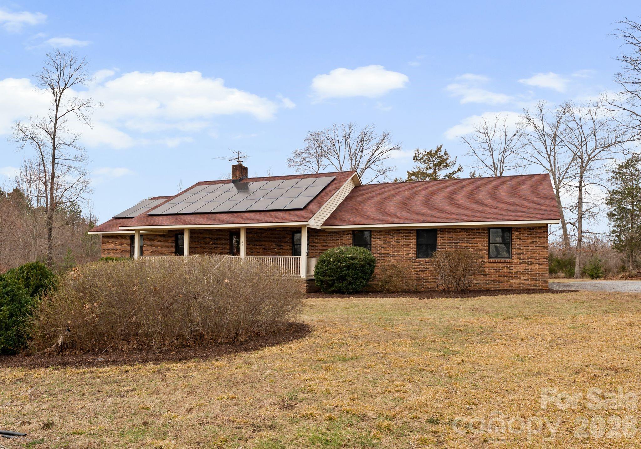 150 Barber Lyerly Road Salisbury, NC 28147 - Photo 4 of 43 a front view of a house with a yard